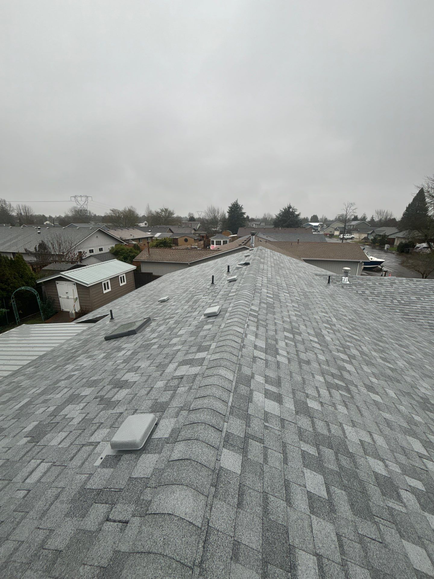 Residential Roofing Installation using IKO Dynasty (Color: Frostone Grey) by Orezona Building & Roofing Company, Inc.