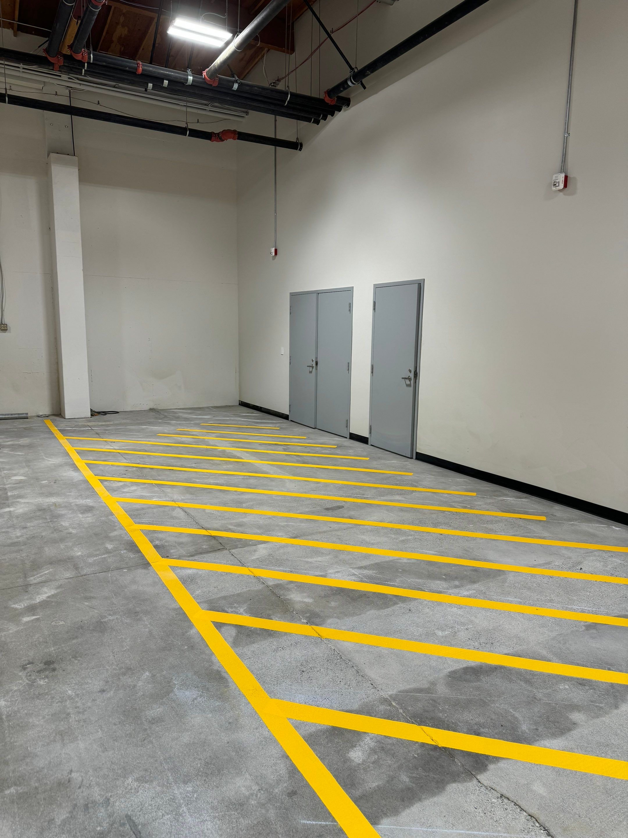 USPS Asphalt Patch Repair, Indoor Parking Lot Sandblast, Outdoor Parking Lot Sealcoating & Indoor/Outdoor Parking Lot Striping  by Jireh Asphalt & Concrete Inc 