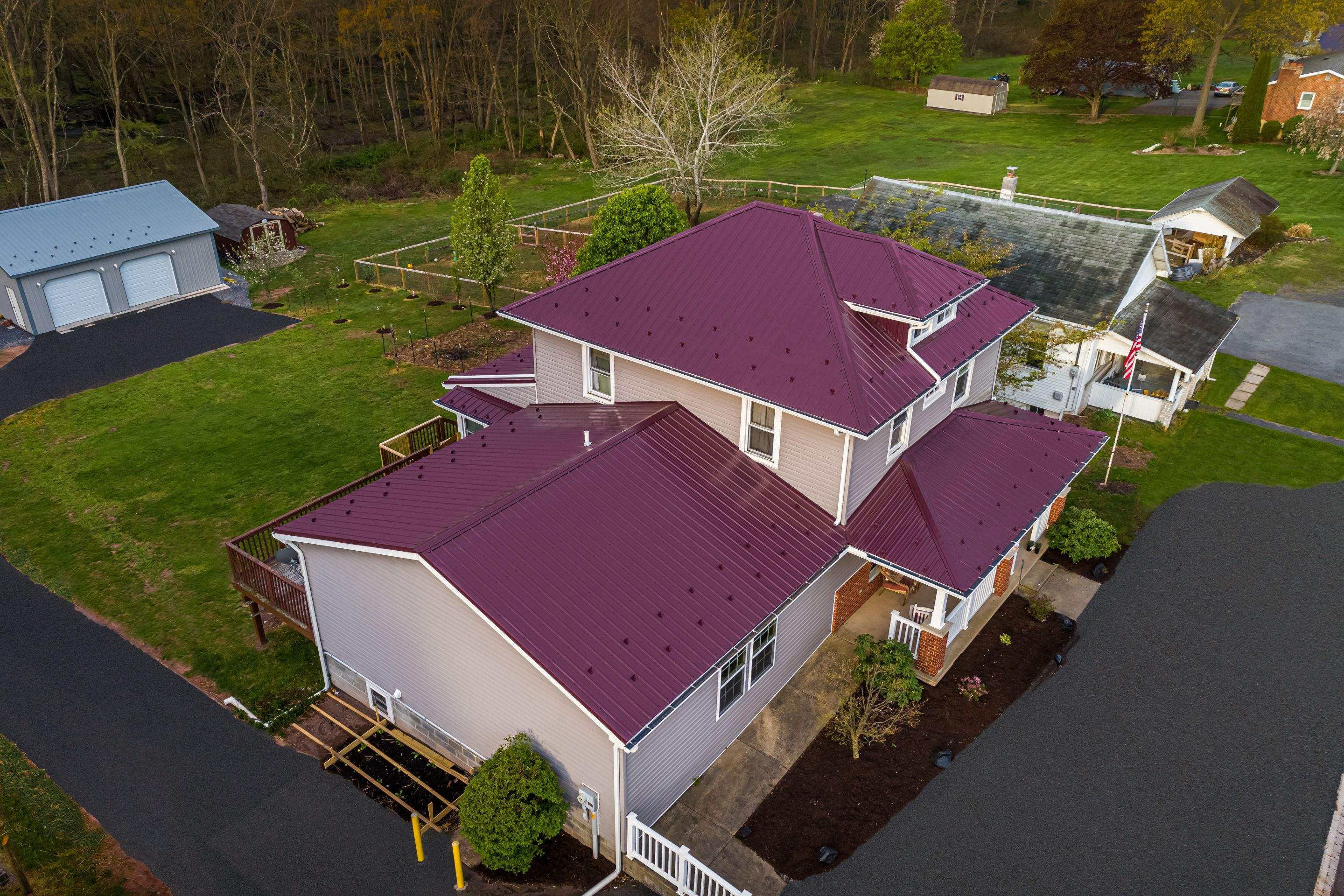 Metal Roof-burgundy by Esh Builders