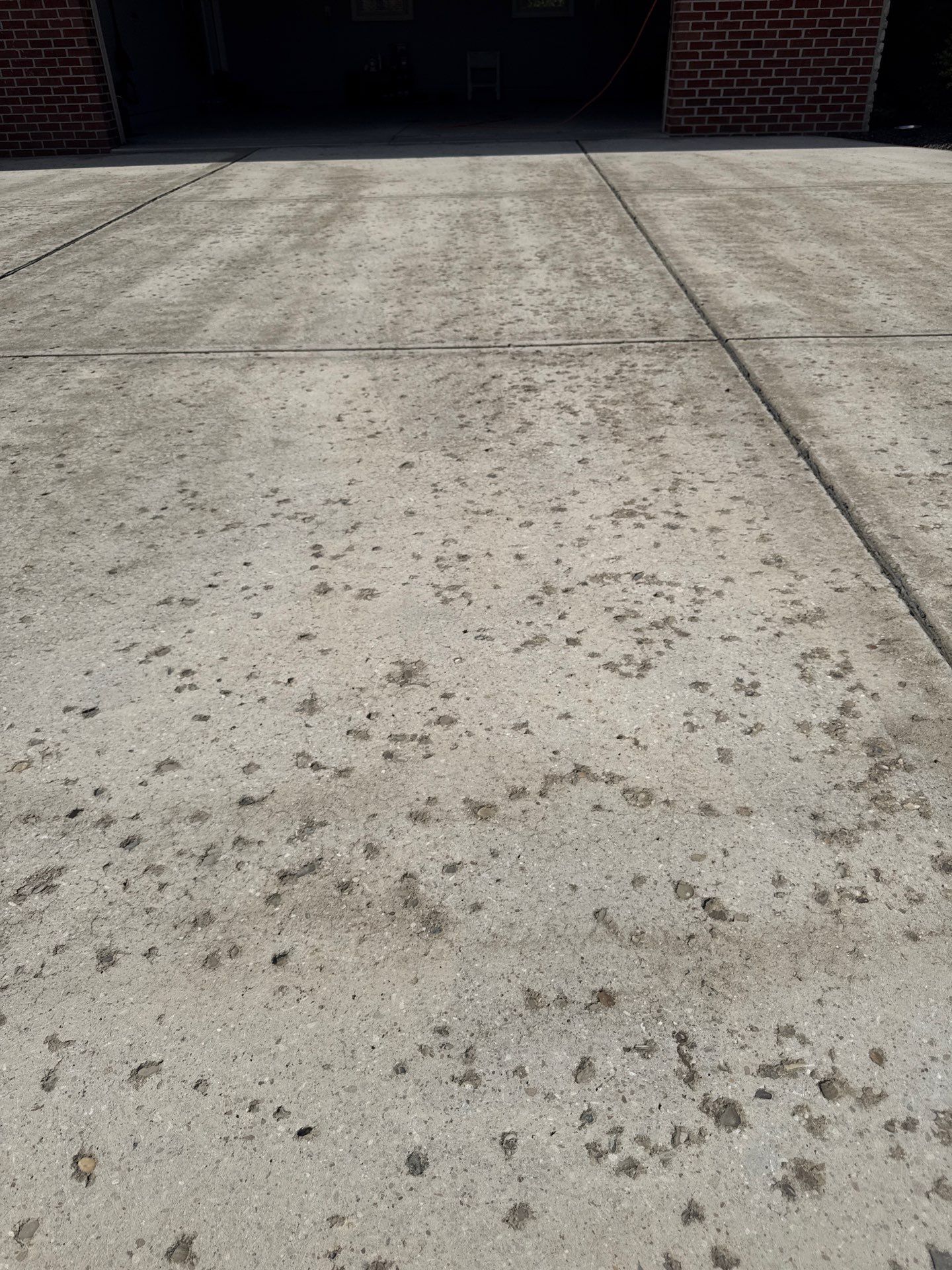 Driveway + Garage + Walkway Project in Meridian by Floors in a Day, Inc