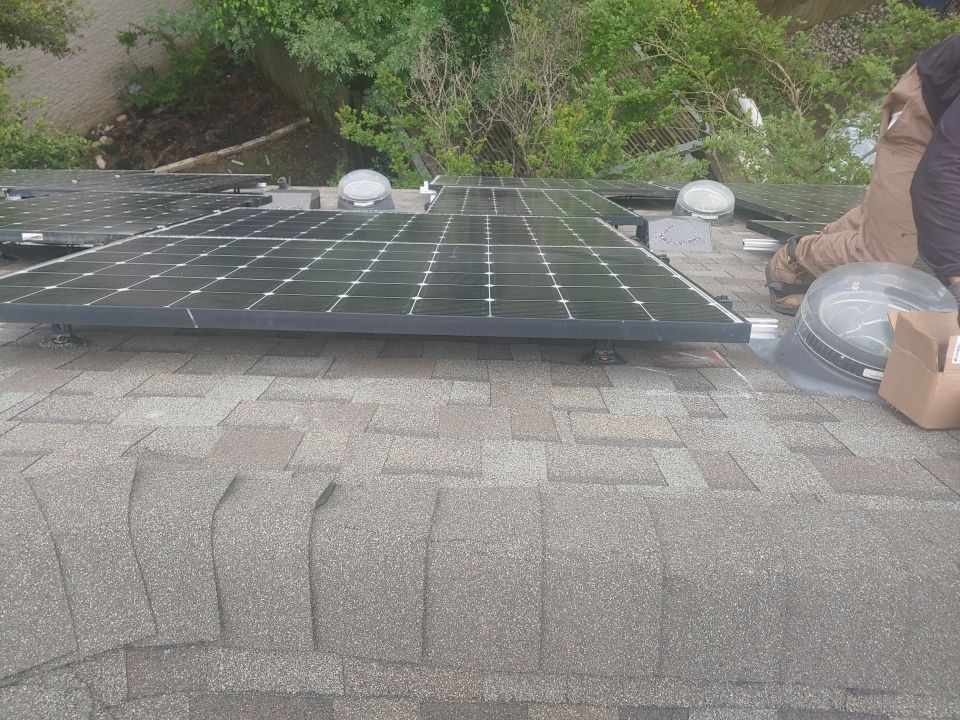 Residential Roof Replacement and Solar Panel Integration in Austin by Caliber Restoration LLC