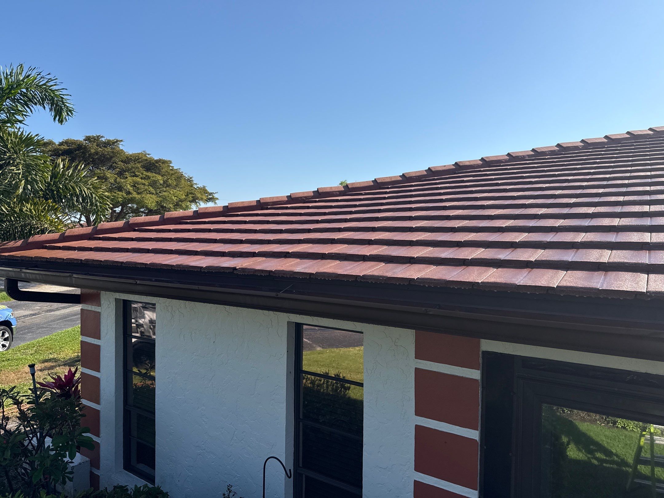 Tile Roof Cleaning – Vivenda at Bradenton I (5-Star Review & Plant Protection) by Sunshine AquaWash