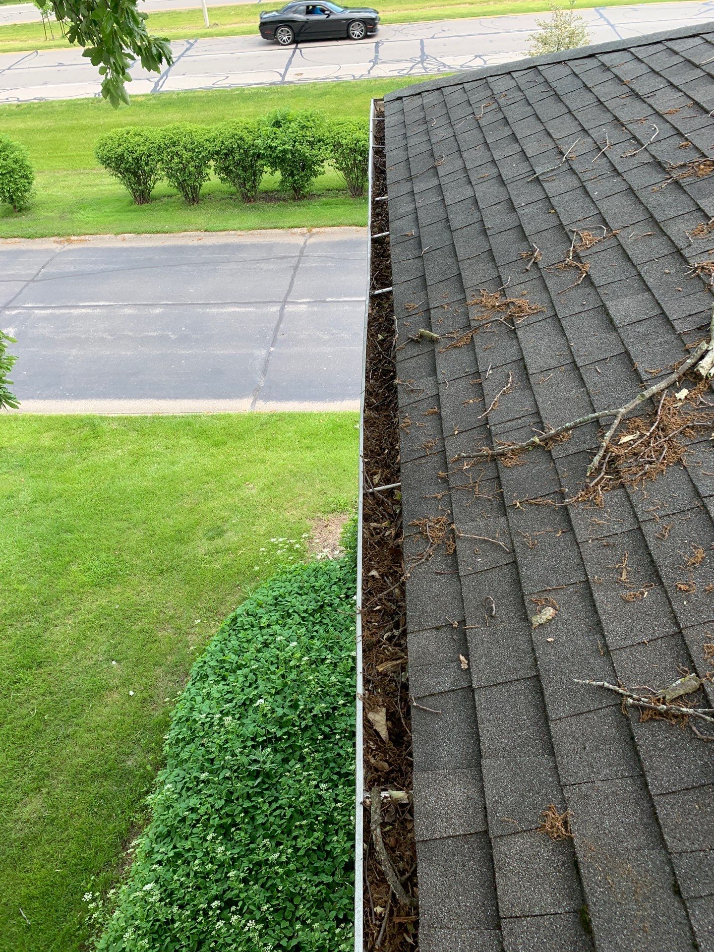 Commercial gutter cleaning Fort Wayne before photo with filled gutters