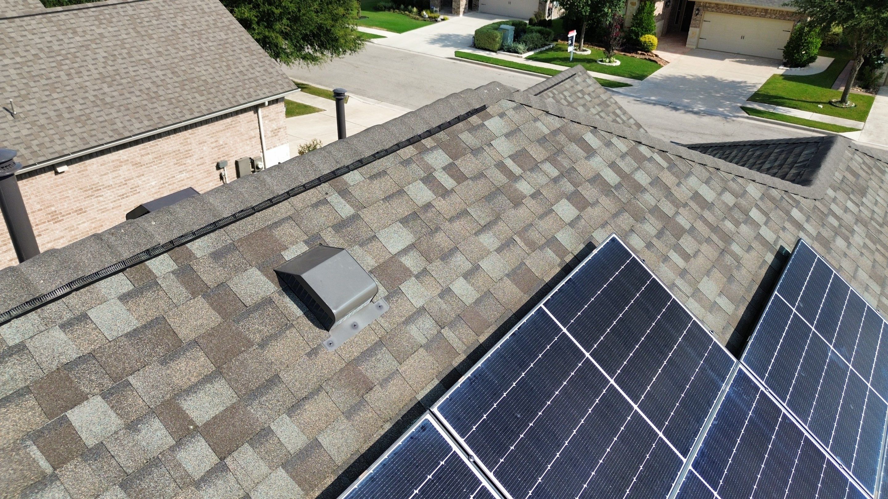 Full Roof Replacement with Solar Reinstall – Duration Driftwood | Round Rock, TX by Kstylez Roofing & Construction