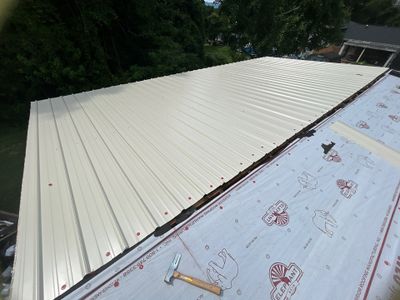 Residential Roofing Installation using Metal