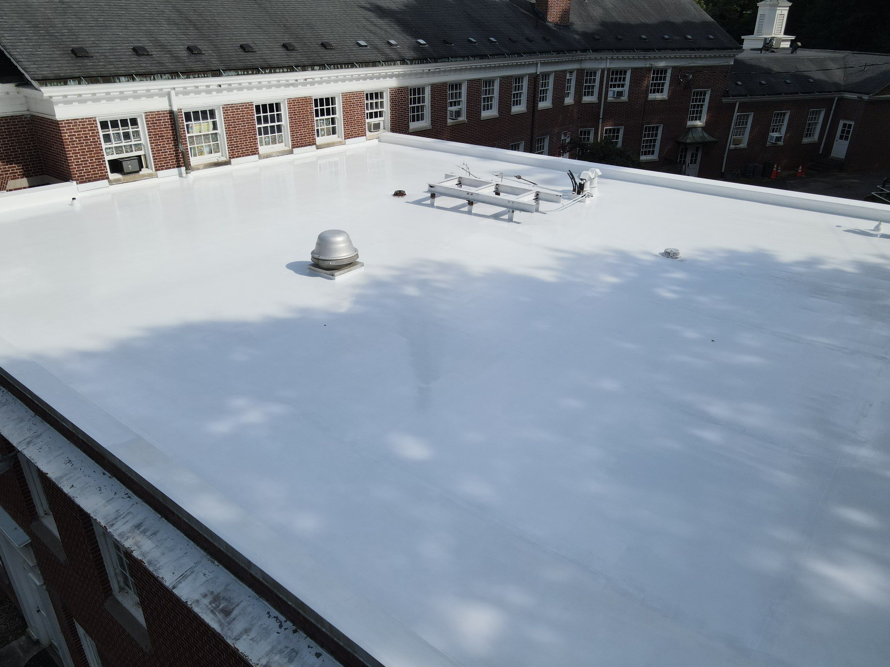 roof coating and partial TPO replacement by Nailed It Roofing & Remodeling LLC