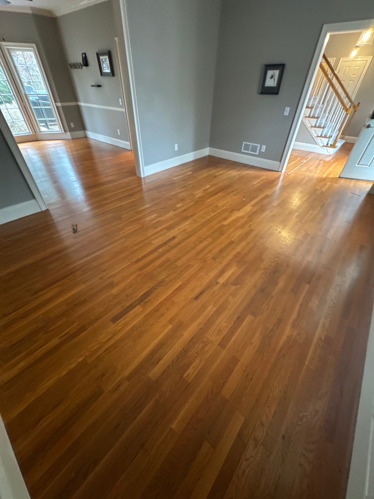 Dark Walnut Hardwood Floor Refinishing and Cabinet Painting in Atlanta by Swift Home Renovations