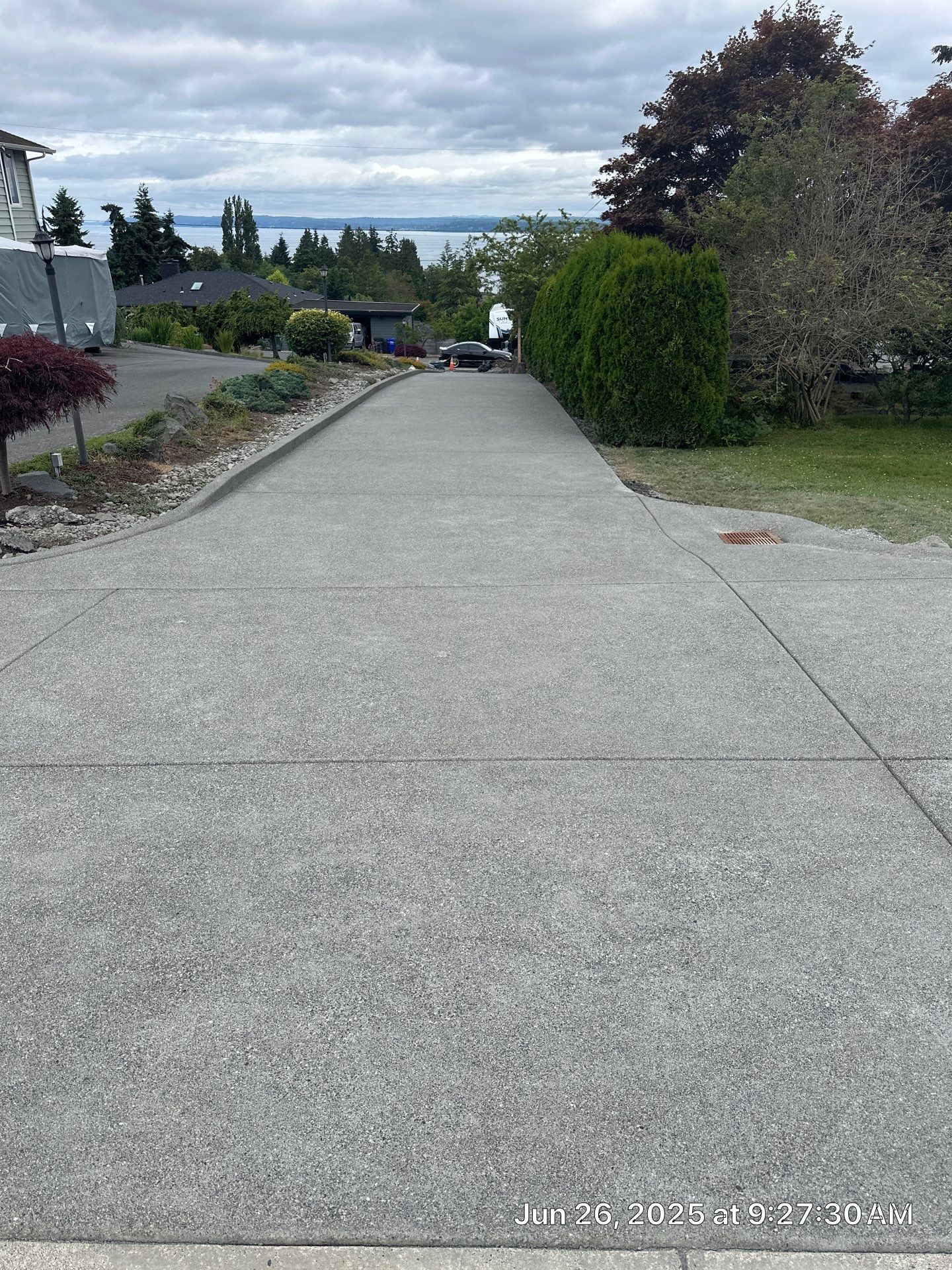 Concrete Driveway Makeover w/ Asphalt Patch | Everett  by Jireh Asphalt & Concrete Inc 