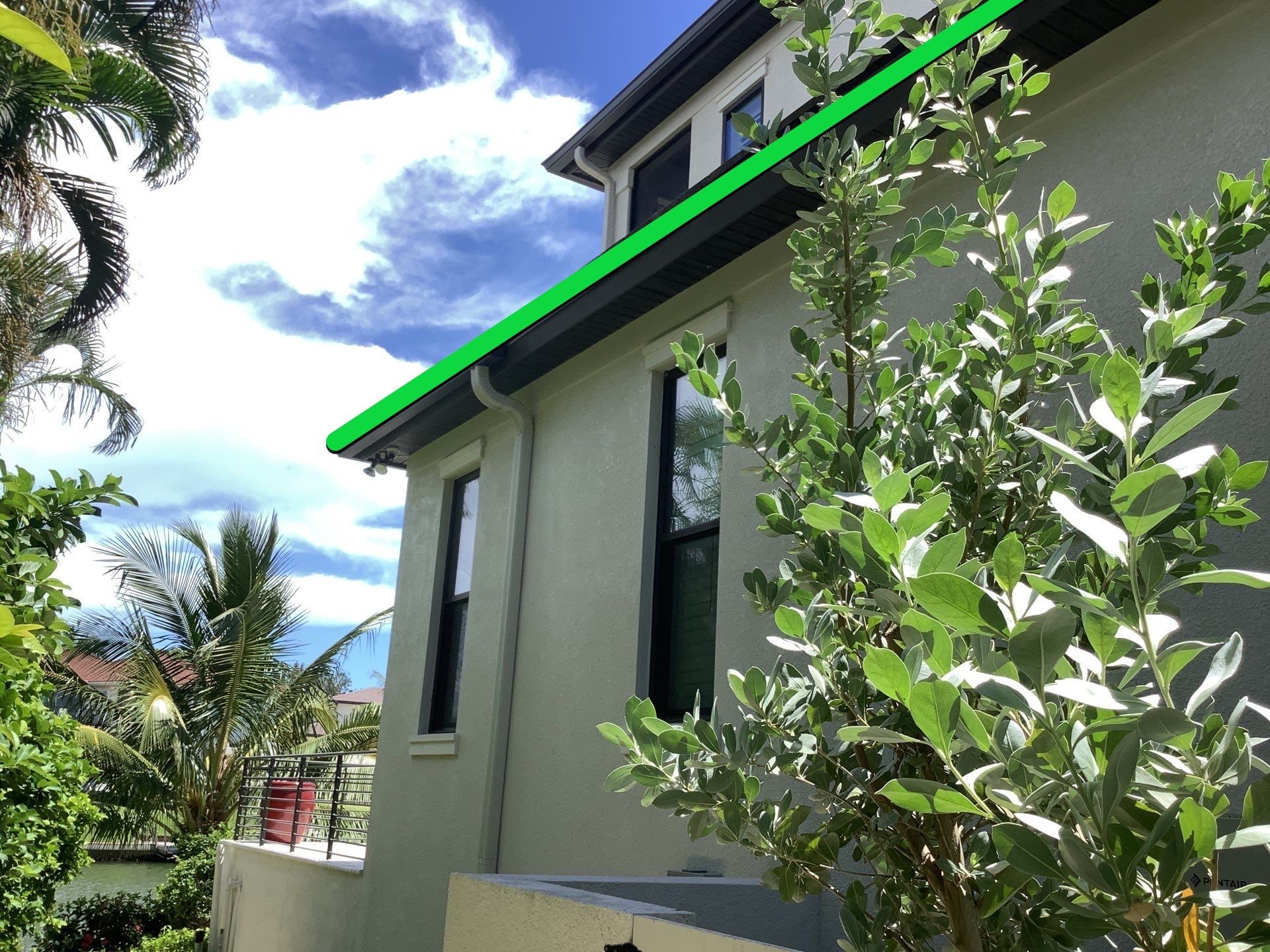Bronze Gutters and Almond Downspouts in Longboat Key FL by Gutter Professors