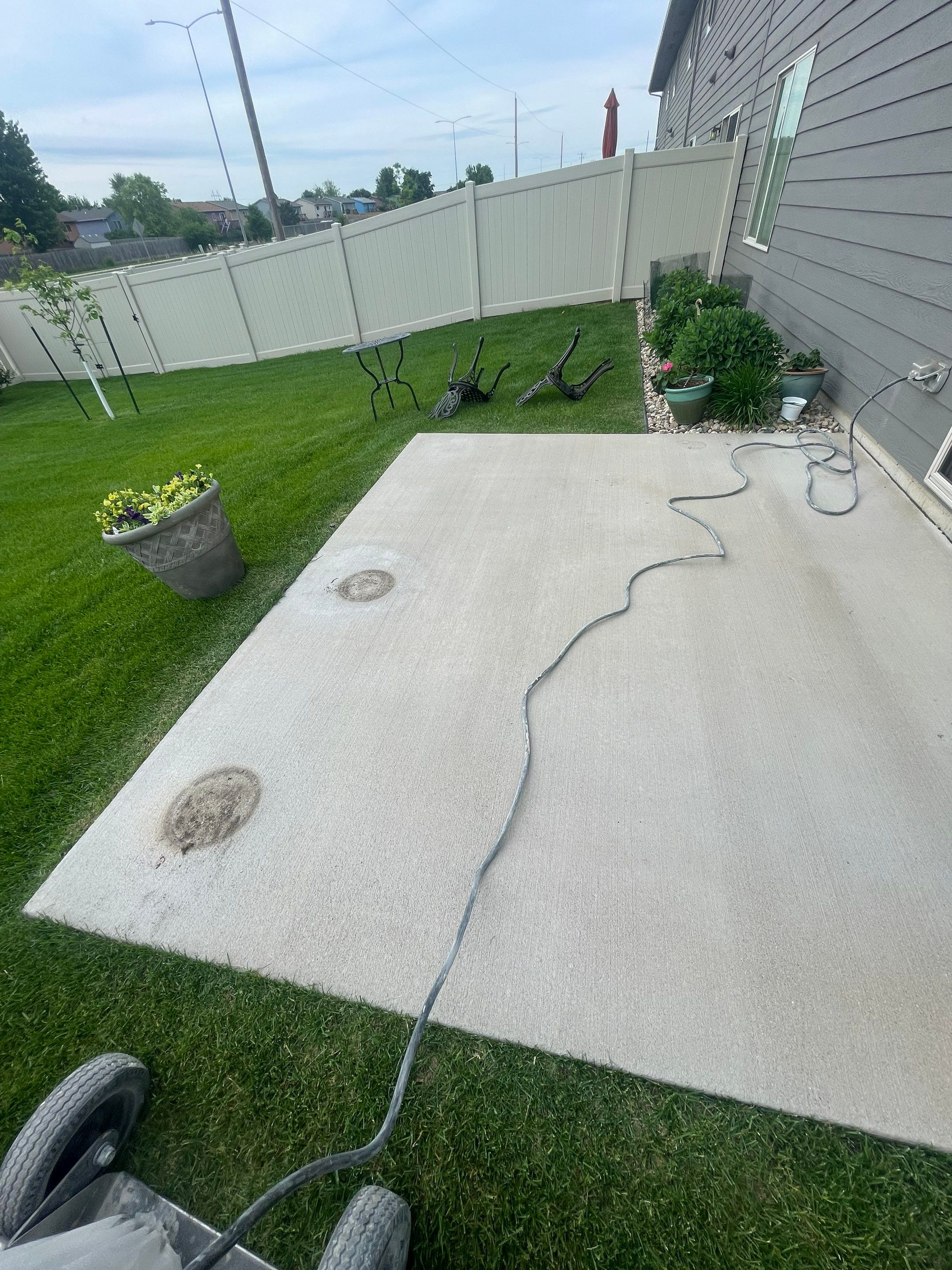 Custom Concrete Coating for Sioux Falls Patio and Front Walkway by Select Painting, Coatings & Garage Cabinets