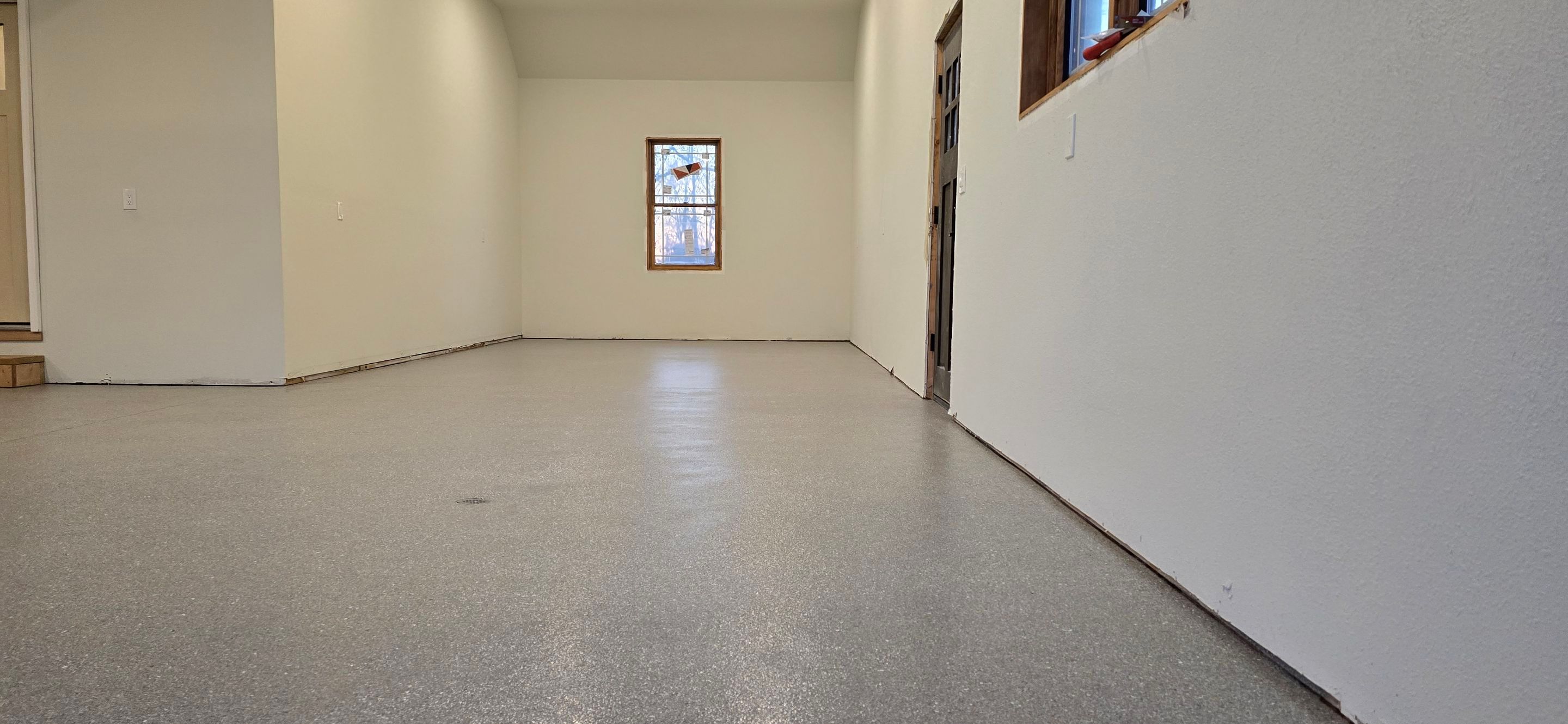 Garage using Travertine by Elite Floor Solutions