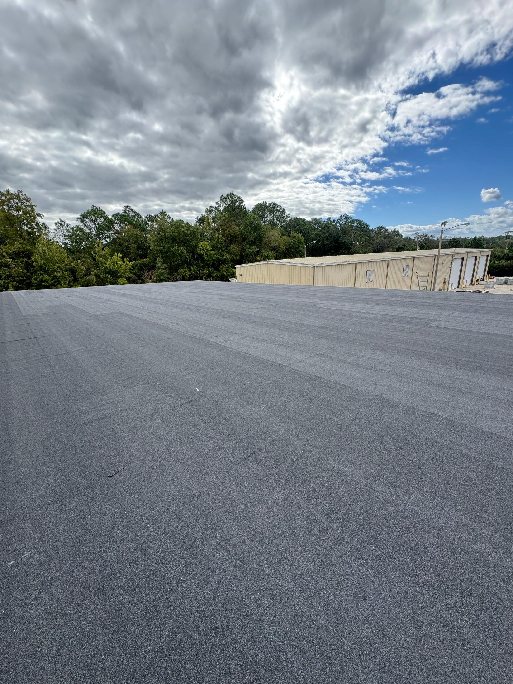 Flat Reroof Replacement Bunnell FL by Pinnacle Roofing Group