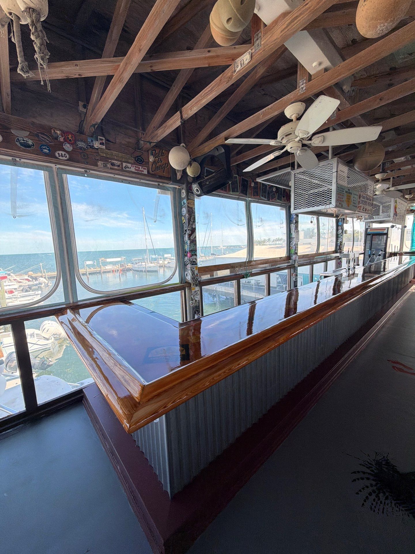 LOCAL FAMOUS FL KEYS BAR REFINISH by Tropical Epoxy Coatings & Creations LLC 
