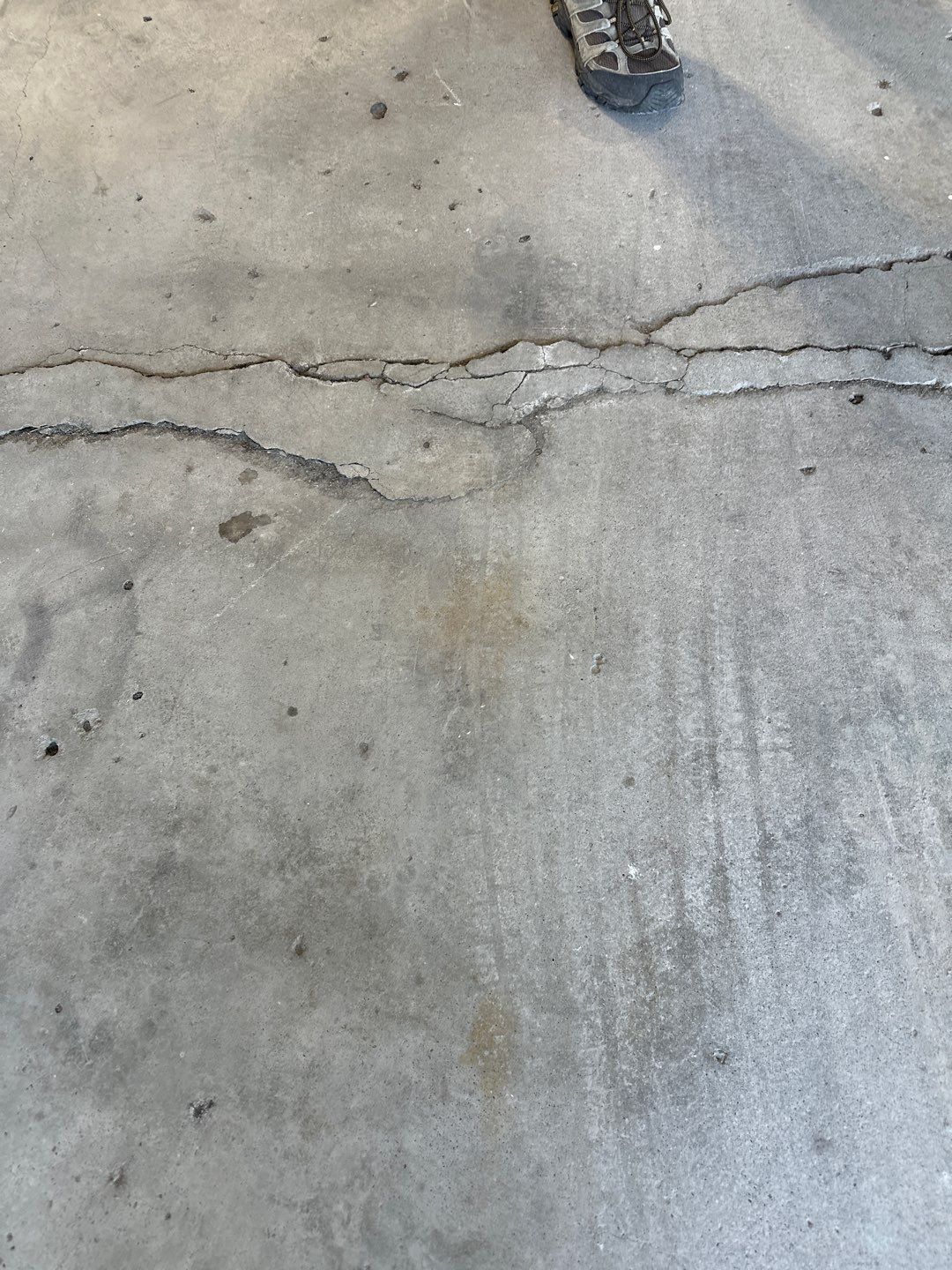 Epoxy Garage Floor Transformation and Concrete Repair in Beatrice by Goat Coatings