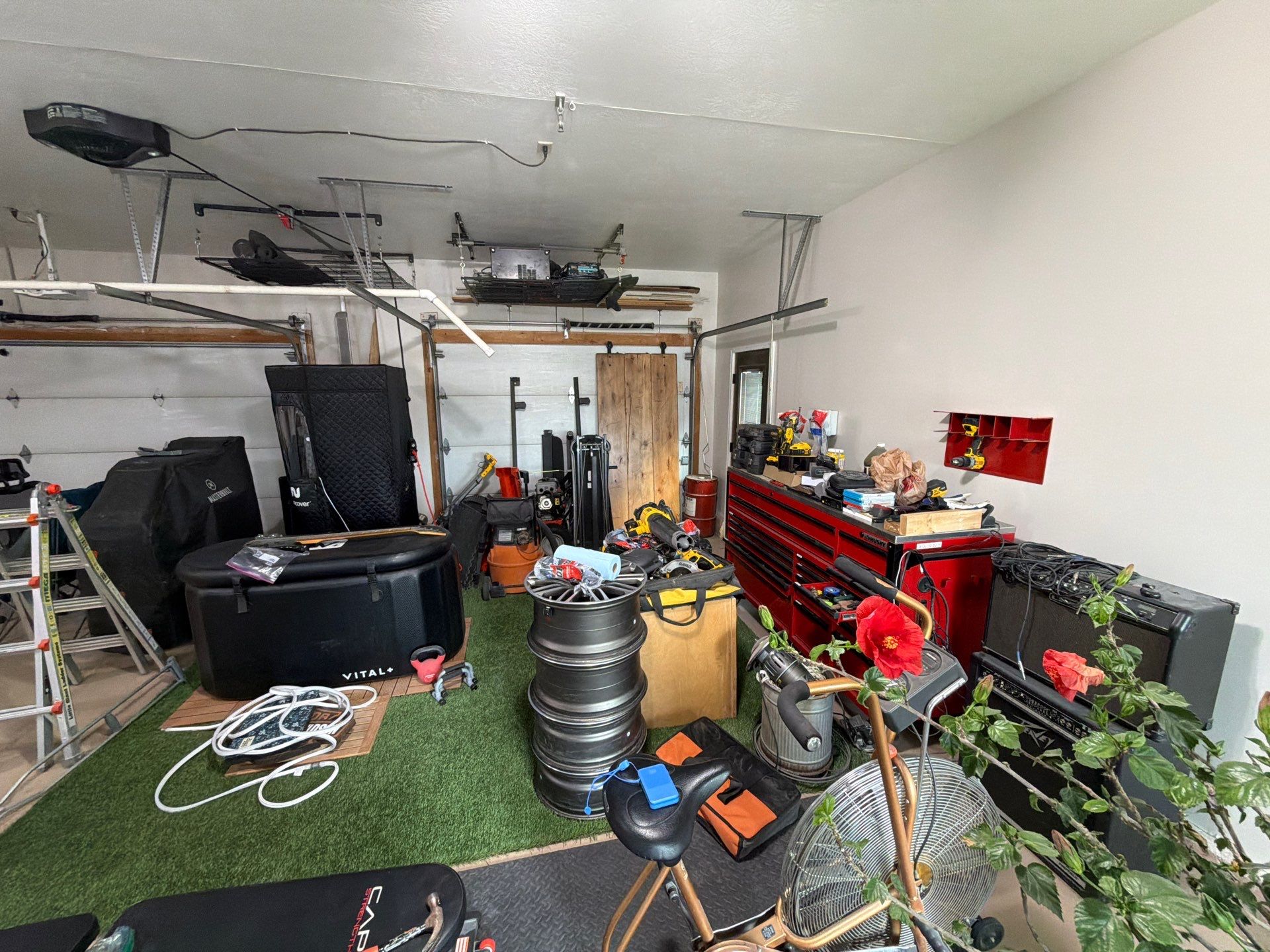 Residential Garage Floor Coating with Grey Speckled Epoxy Finish by Select Painting, Coatings & Garage Cabinets