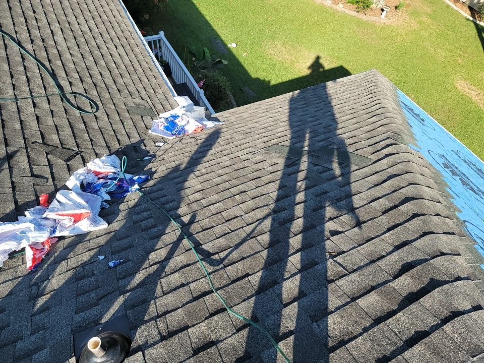 Residential Roofing Installation using Roof Replacement by American Roofing & Construction LLC