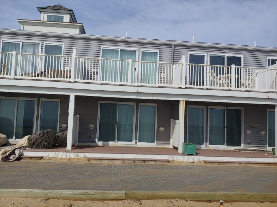 Gutter Installation using 6" K-Style Aluminum Gutter on the Seaside Inn in Truro, MA by Gutter Pro Enterprises