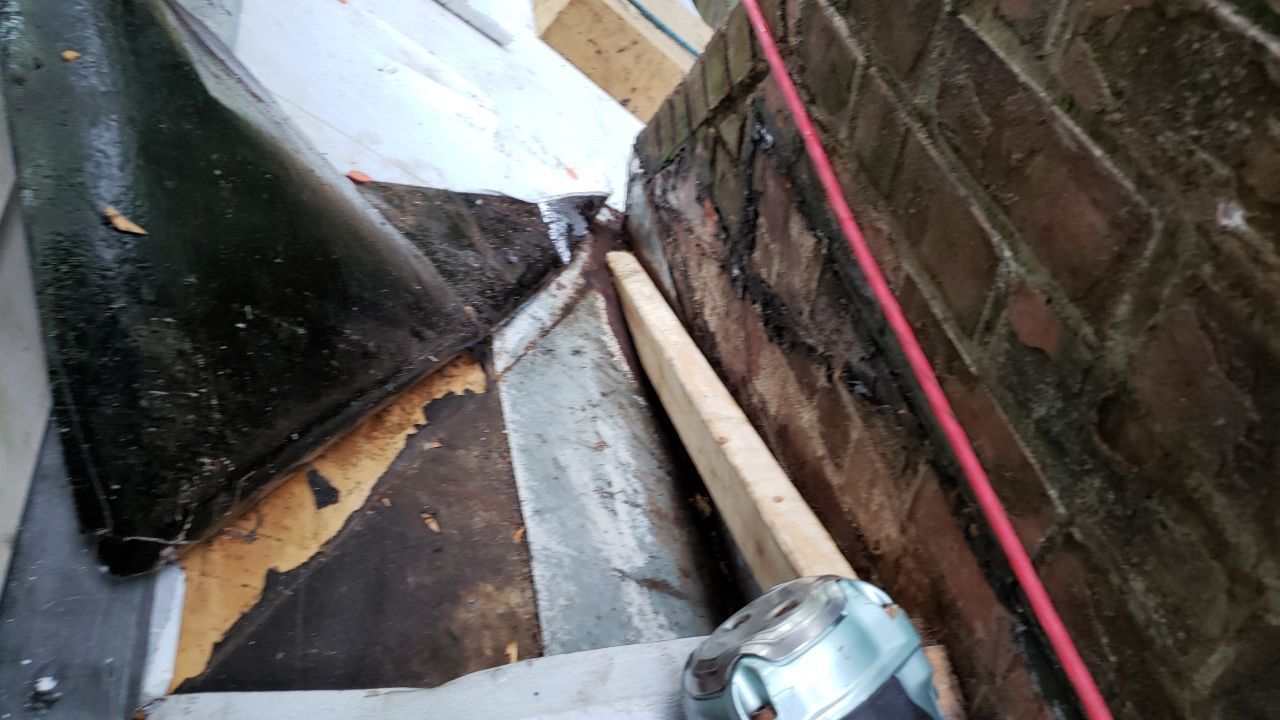 Residential Roofing Installation using Roof Replacement by American Roofing & Construction LLC
