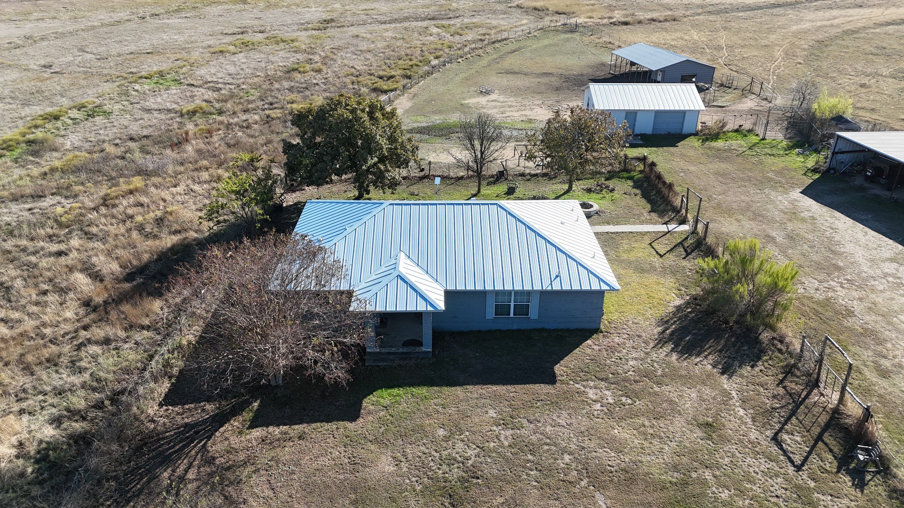 Residential Roof Replacement using 24 GA Standing Seam by Action Exteriors Austin