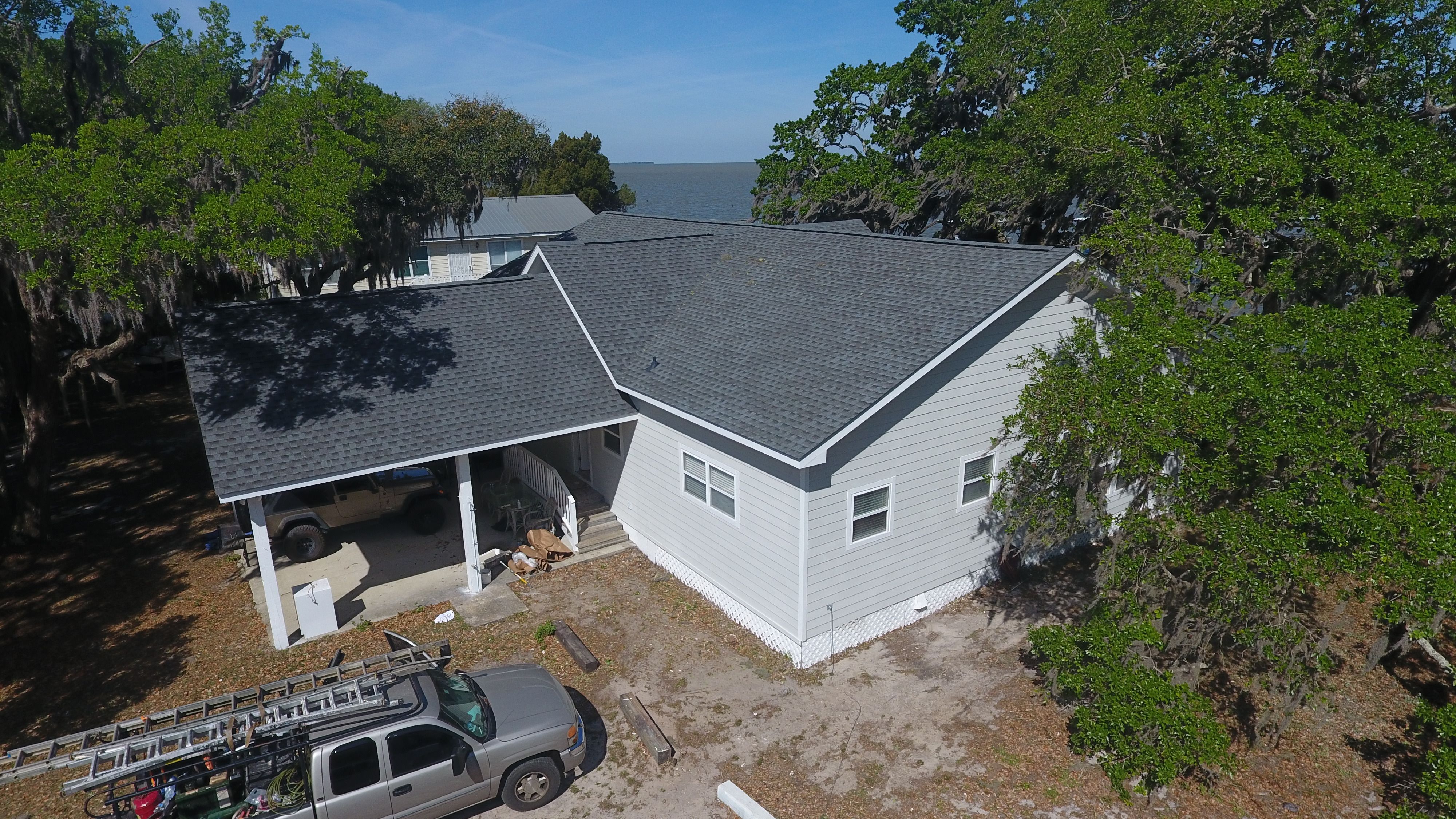 Residential Roofing Installation using Roof Replacement by American Roofing & Construction LLC
