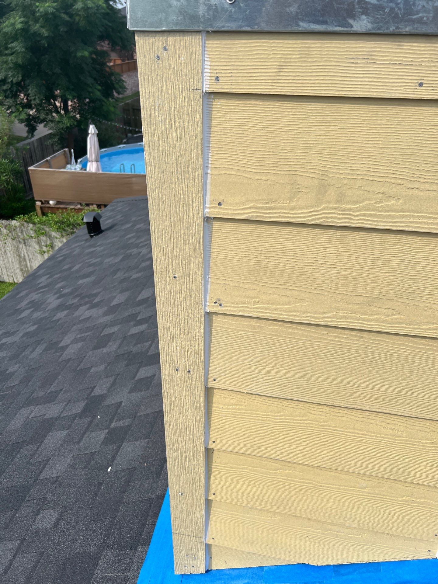 Nothing looks nicer than a little black roof by Bayfront Roofing and Construction