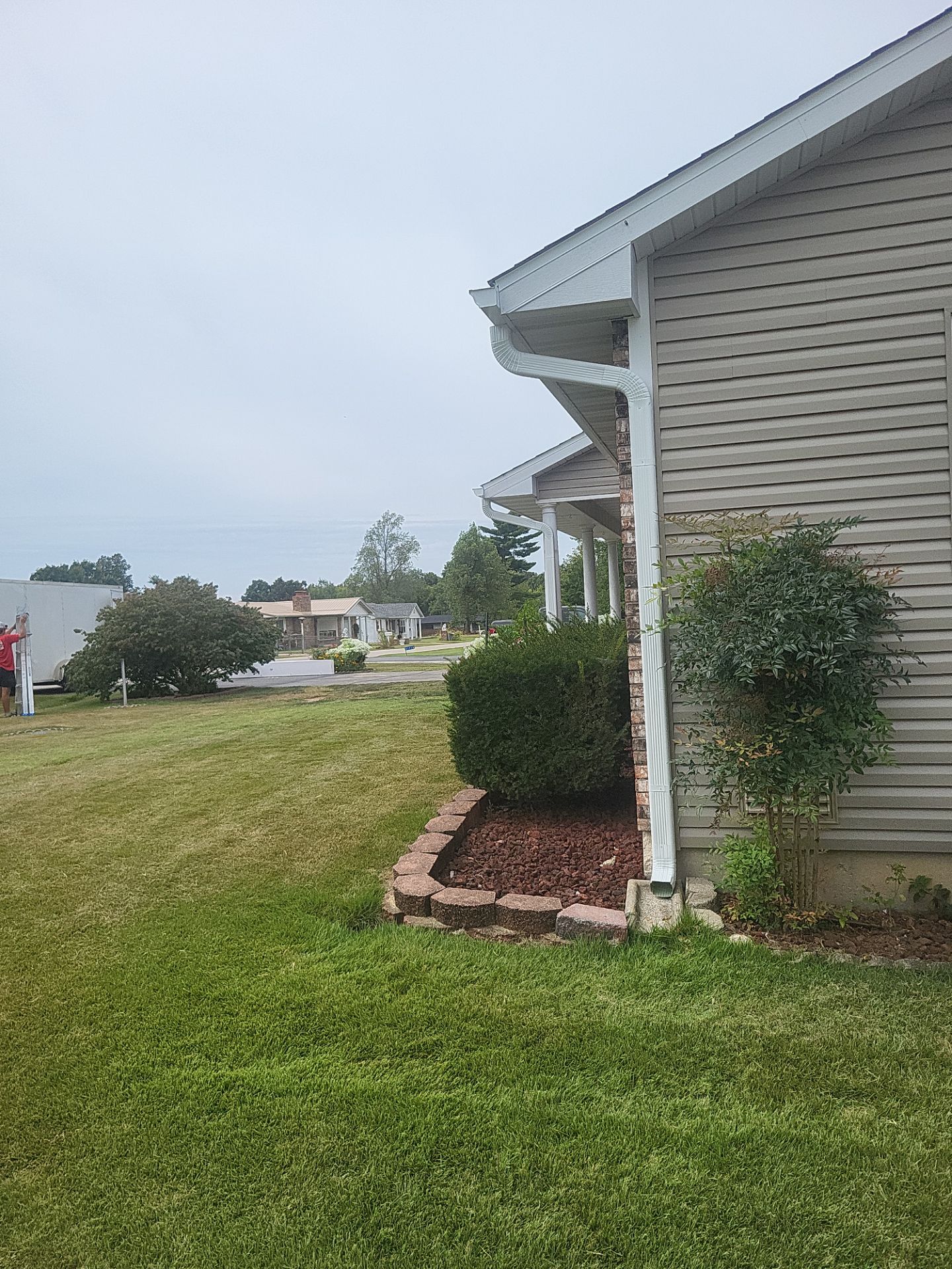 Residential Roof + Gutters & Downspouts Install  by Titan Commercial & Residential Roofing 