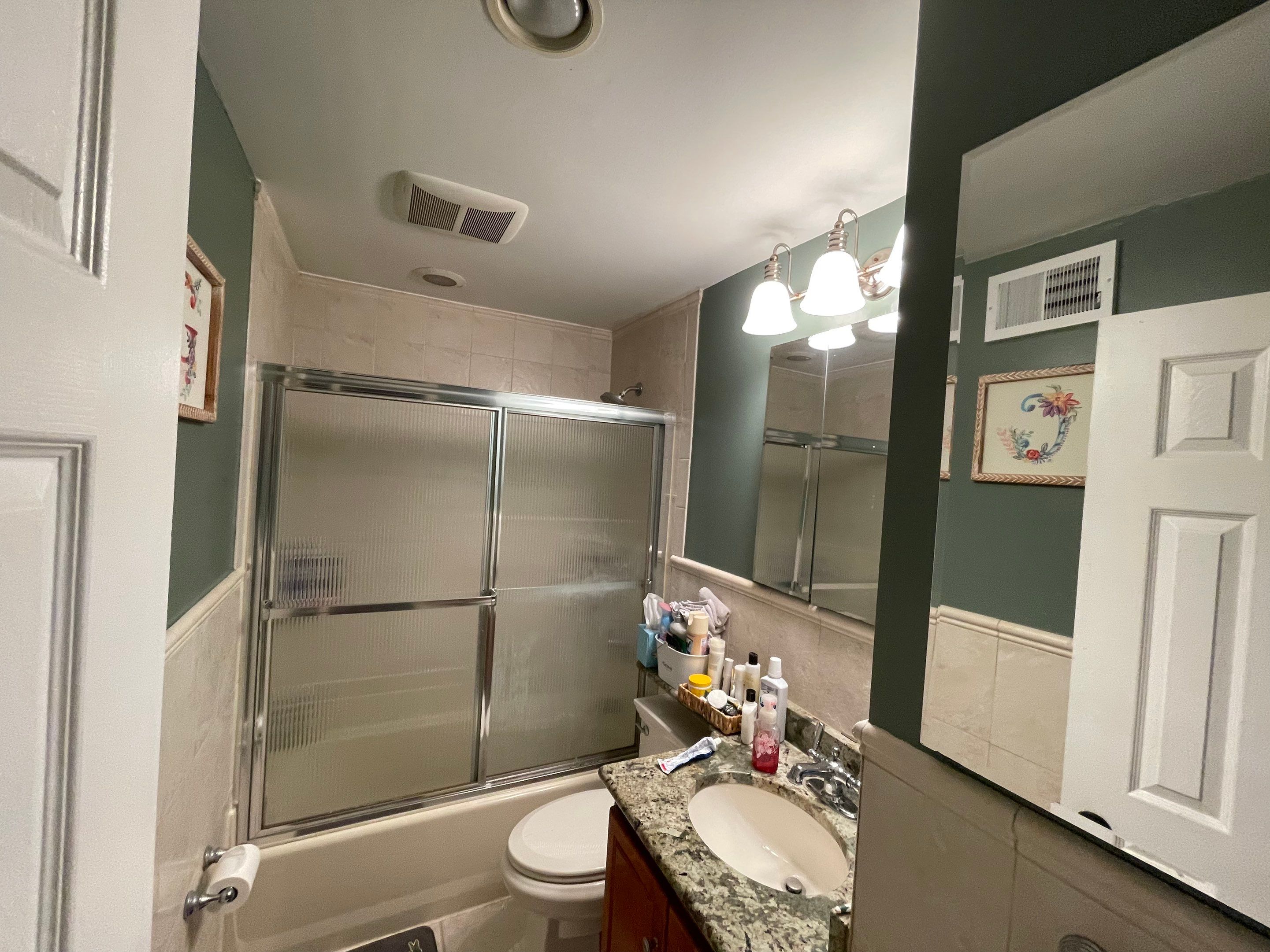 Bathroom Remodel using Cabinets by Home Concepts Construction