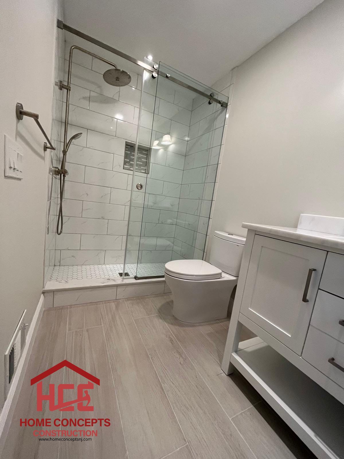 Bathroom Remodel using Tile by Home Concepts Construction