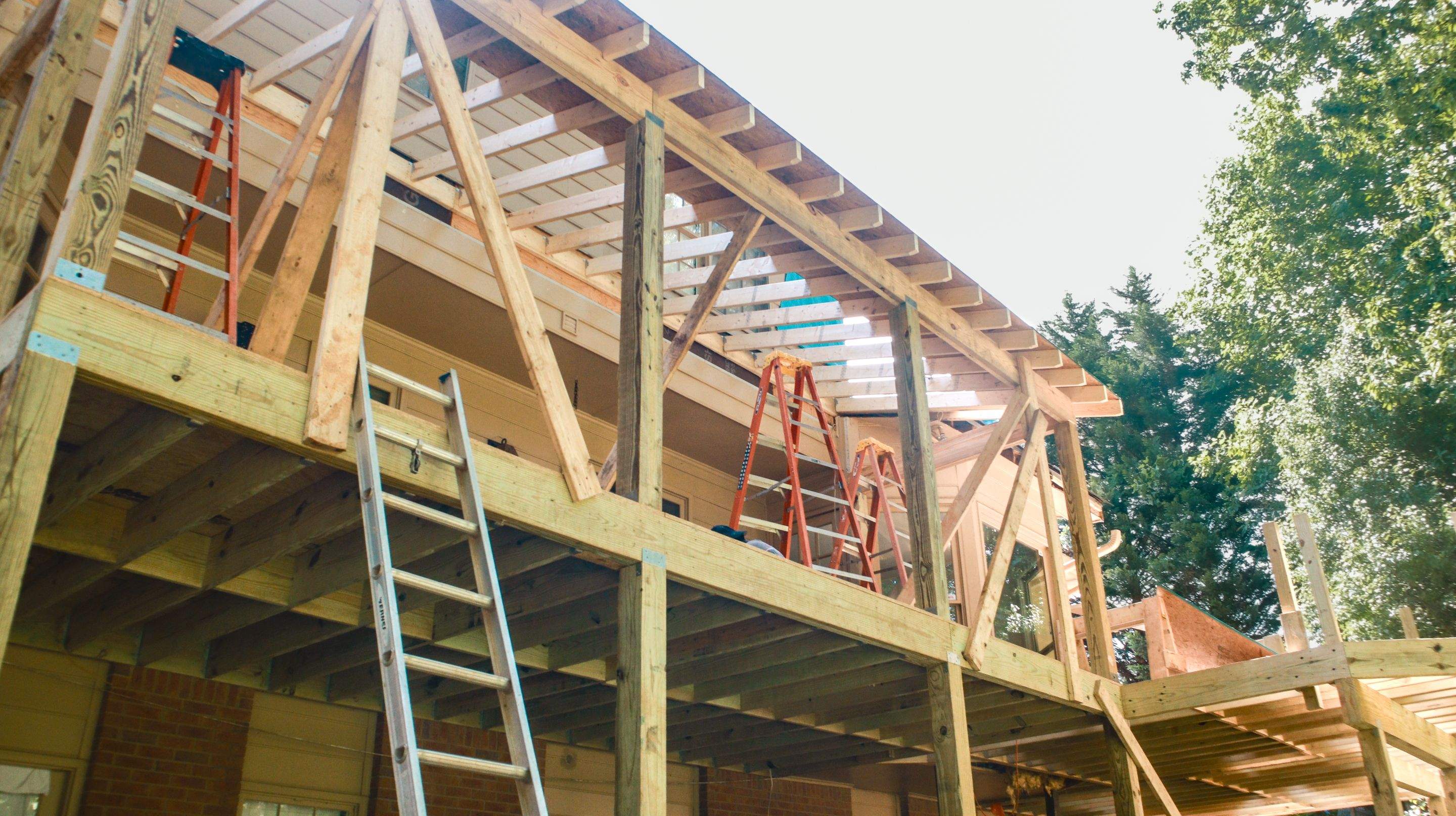 Deckorators Voyage Deck and Shed Style Covered Porch Build with Drink Rail by Nelson Exteriors 