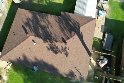 Storm Restoration Reroof: 40 Year Impact Rated Architectural Shingle