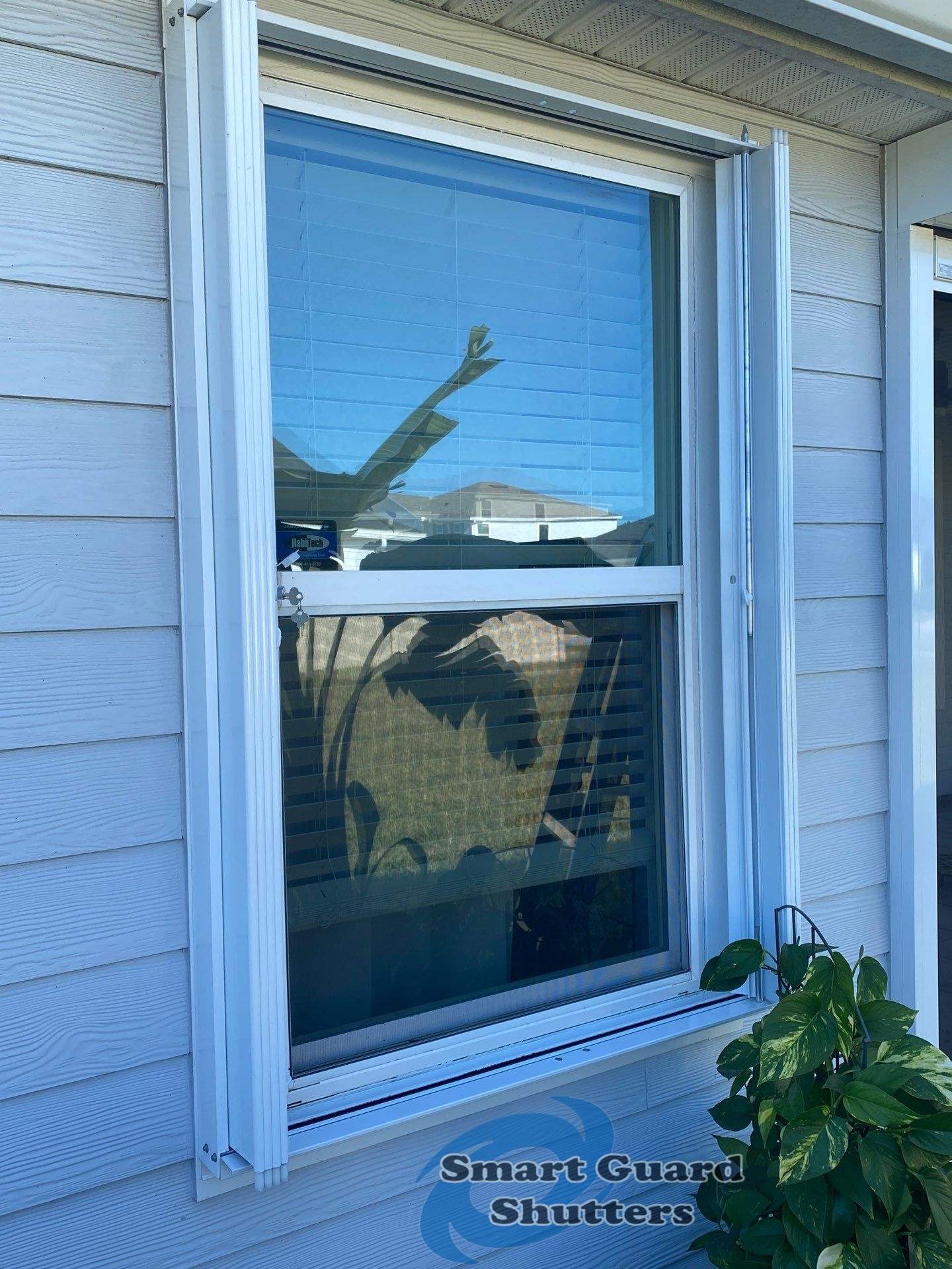 Hurricane Protection in White by Smart Guard Shutters