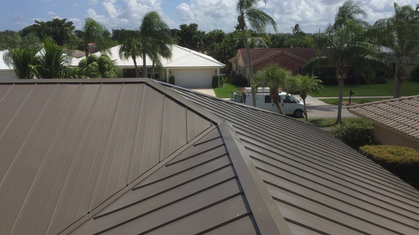 Residential Roofing Installation using 1" Nail strip metal roof by BLUES BROTHERS CONSTRUCTION CORP