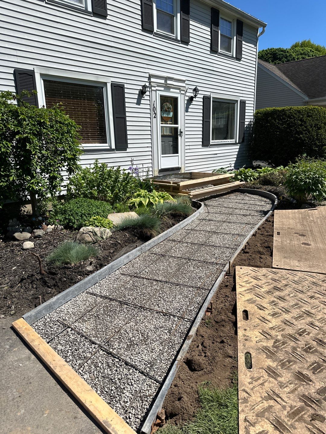 Broom Finish Walkway  by NG Masonry & Construction LLC