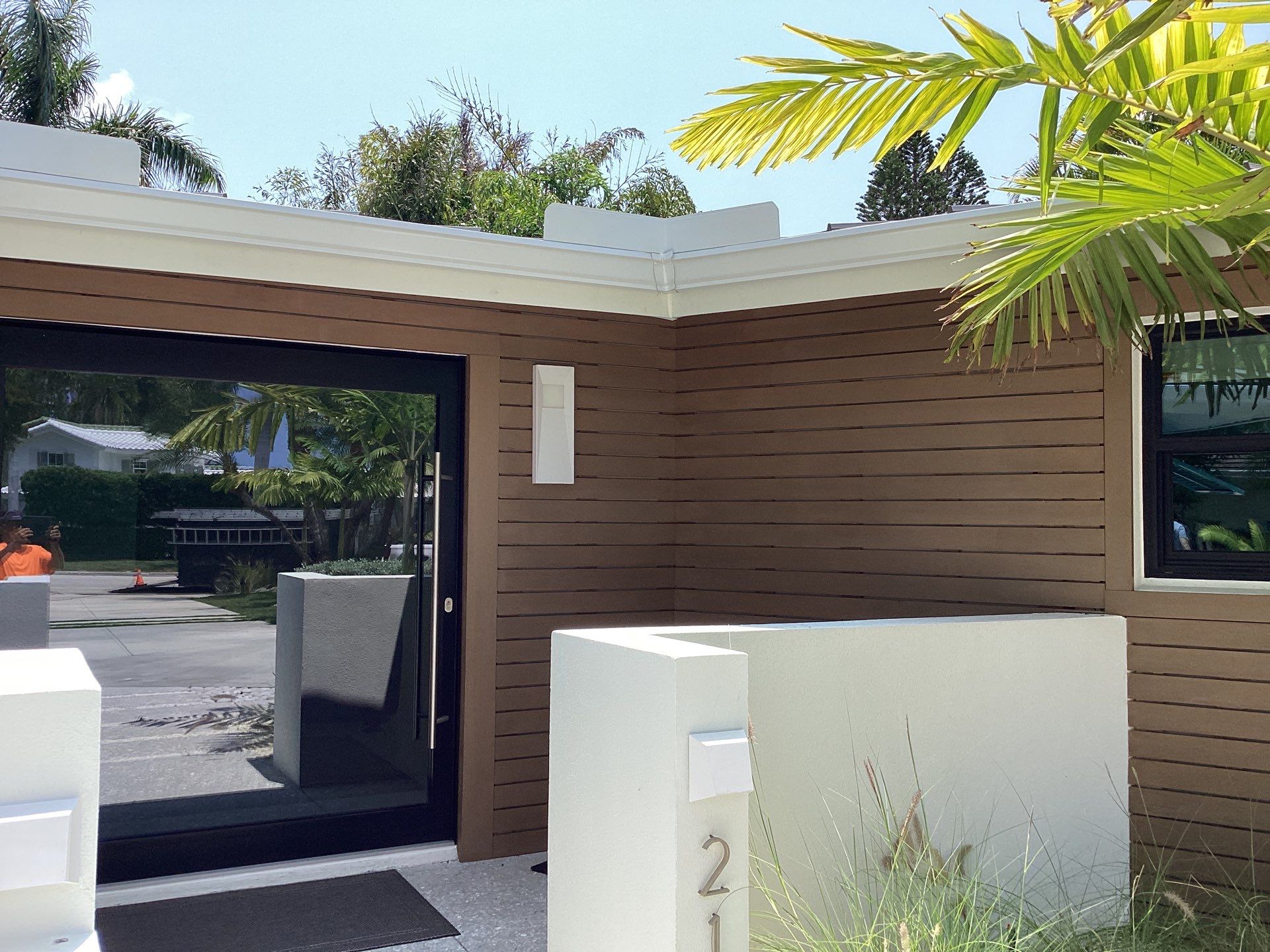 White Seamless Gutters and Downspouts in Sarasota FL by Gutter Professors