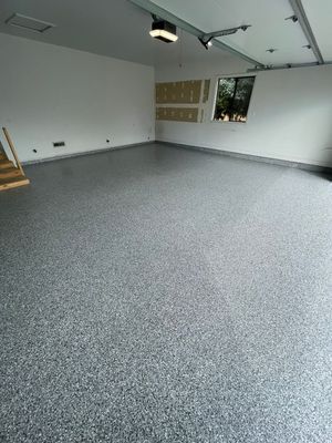 Grey Speckled Concrete Coating for Residential Garage in Yankton