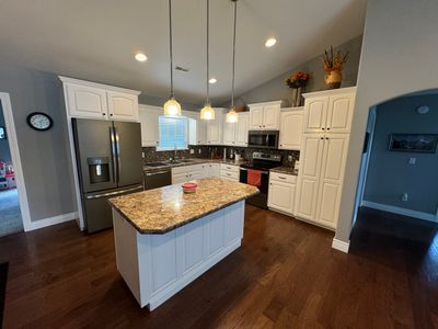 Cabinet Repaint off S Country Club