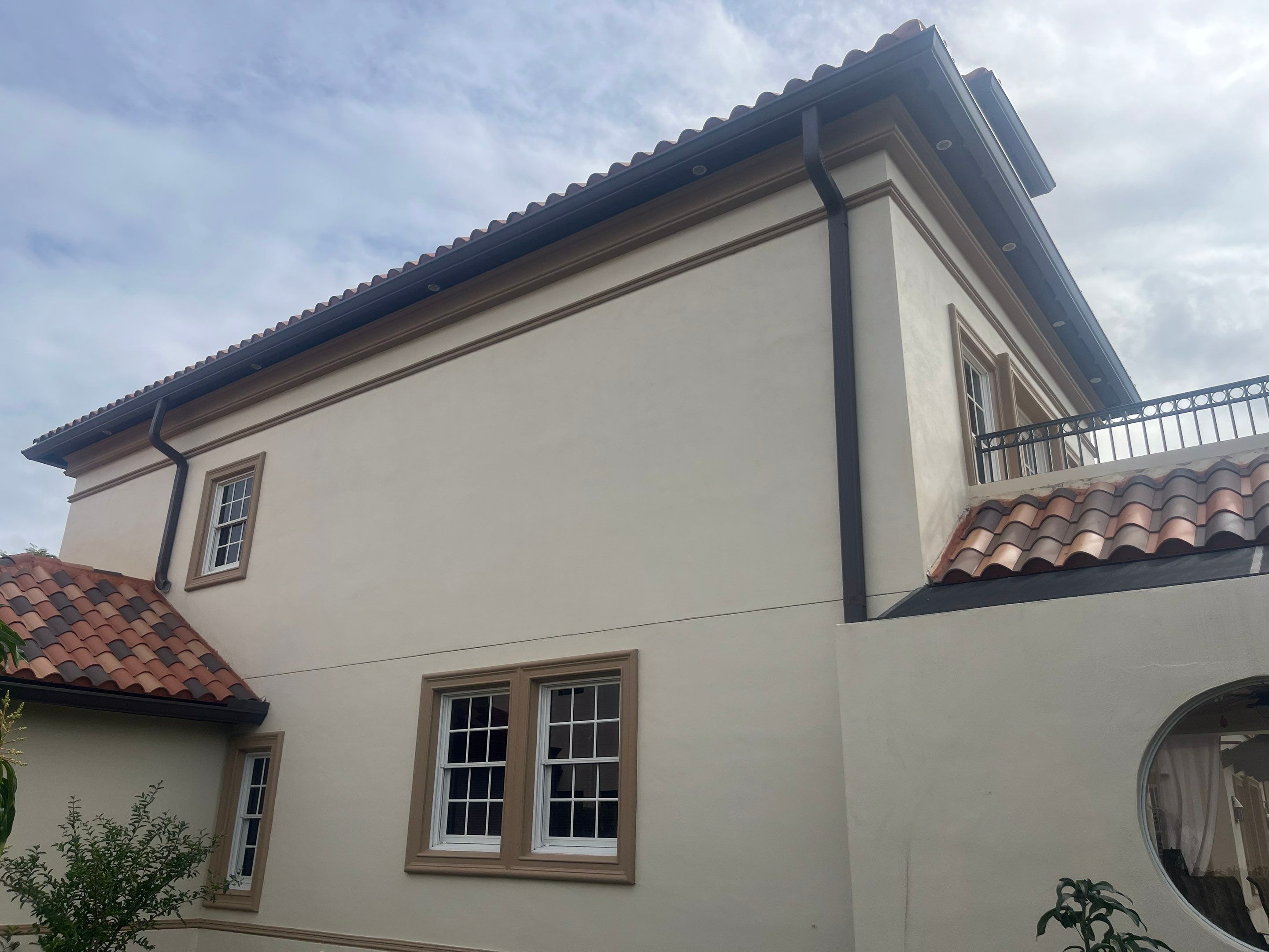 Musket Brown Seamless Gutters using Musket Brown Seamless Gutters in Cape Coral FL by Gutter Professors