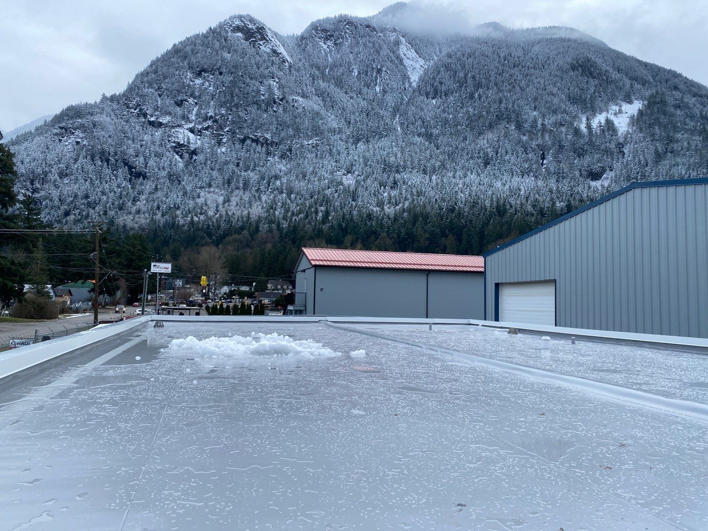 Commercial Roofing Installation using Durolast by Top Notch Roofing Inc