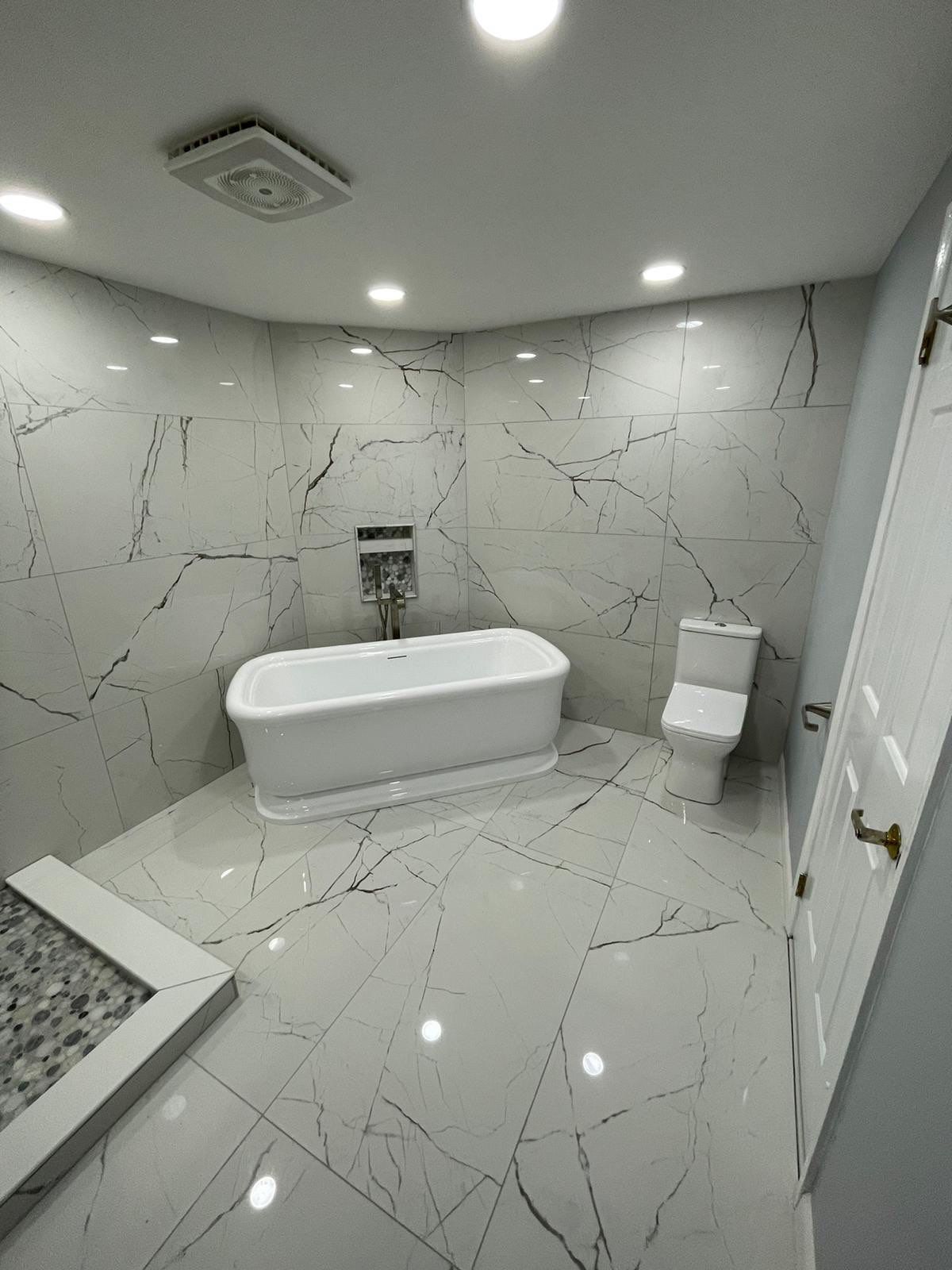 Bathroom Remodel using Tile by Home Concepts Construction