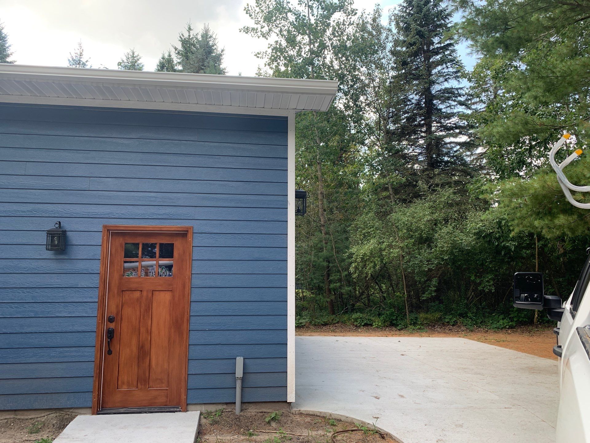 Gutter and Gutter Helmet Installation for Lake Leelanau Home by Rainbow Seamless Systems