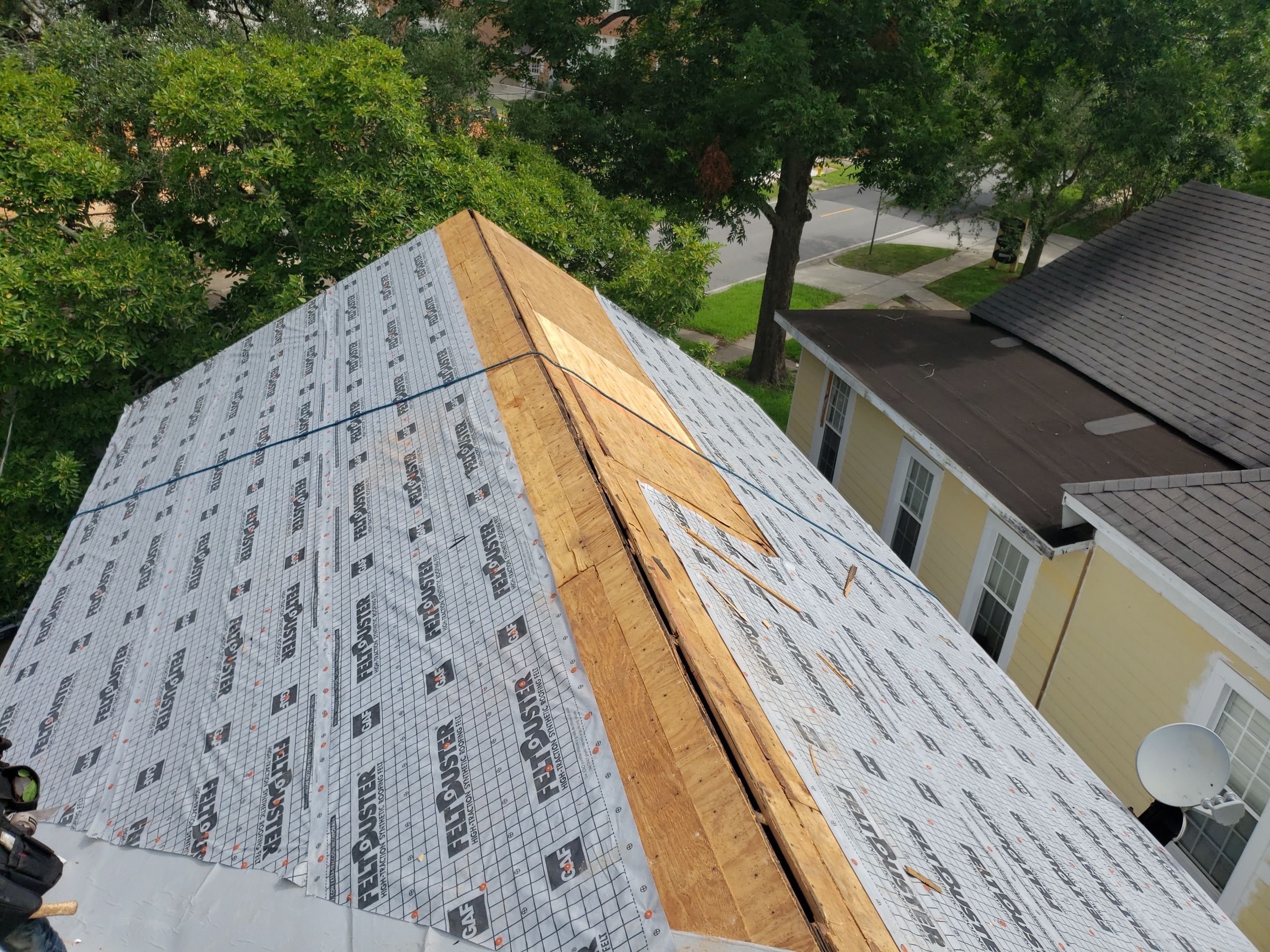 Residential Roofing Installation using Roof Replacement by American Roofing & Construction LLC