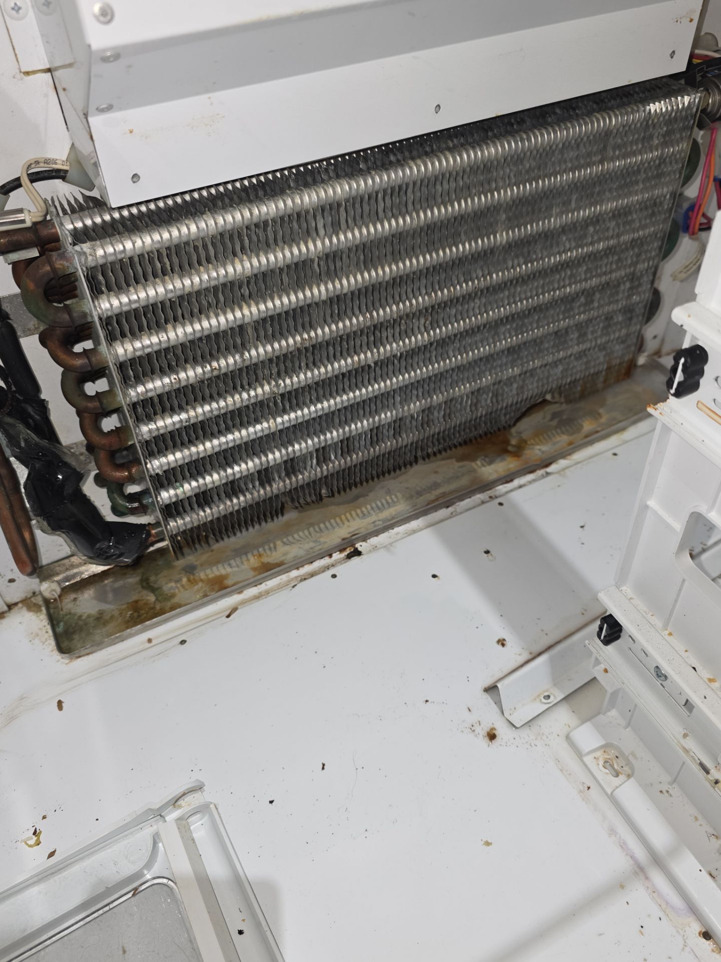 GE Monogram Built-In Refrigerator Cooling System Repair in Clermont by AMB-WORKS APPLIANCE REPAIR