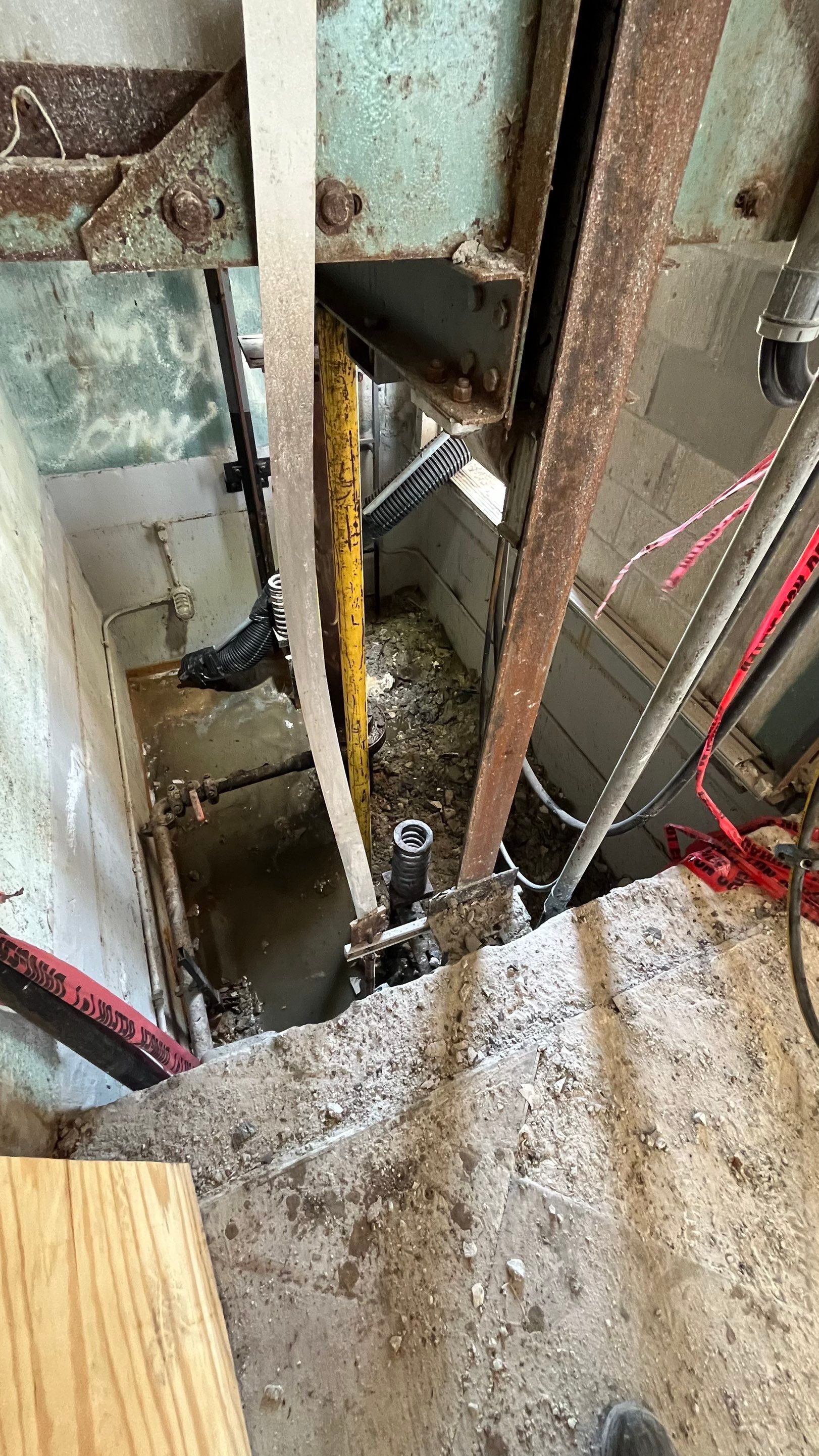 Condo Elevator Shaft Clean Out and Remove Bloackage in Storm Drain System by APS Power & Water