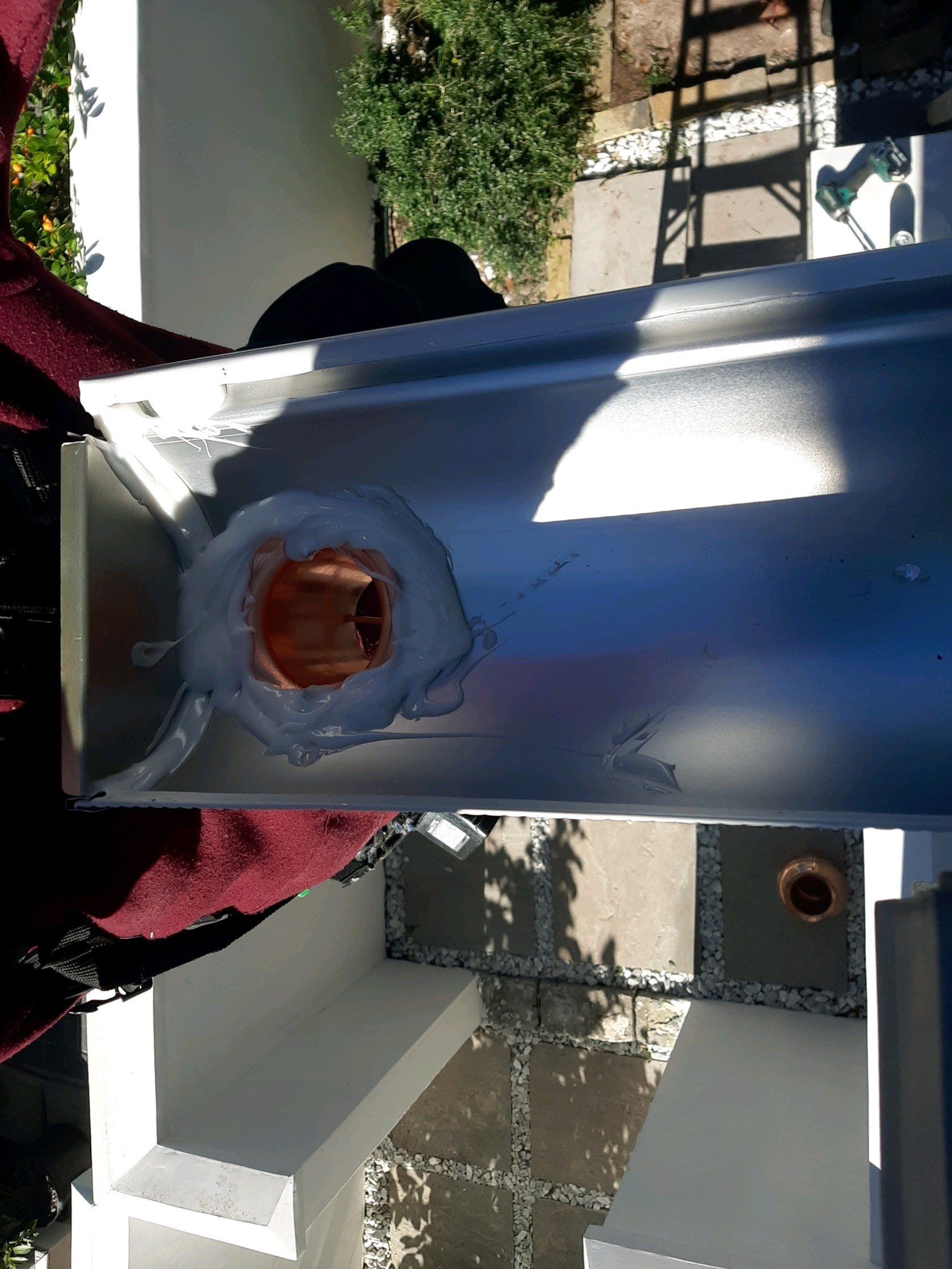 Gutter Installation Using White 6 Inch Seamless Gutters by Gutter Professors