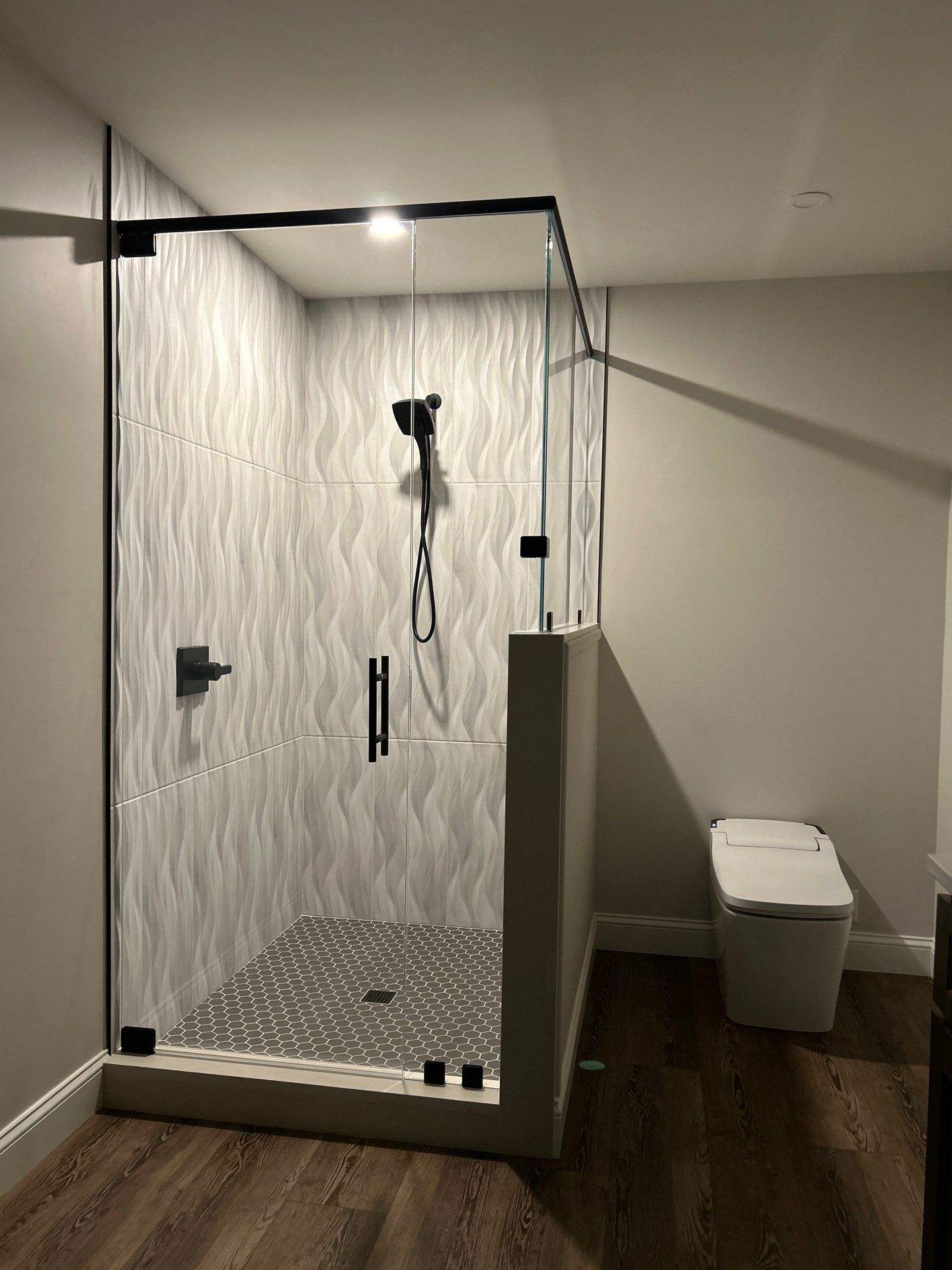 Frameless Shower Enclosure w/Header Bar by Cheshire Glass Company
