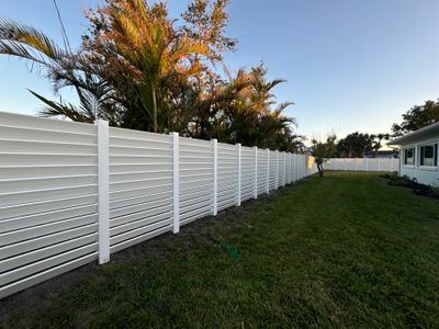 Louvered Vinyl Privacy Fence - White