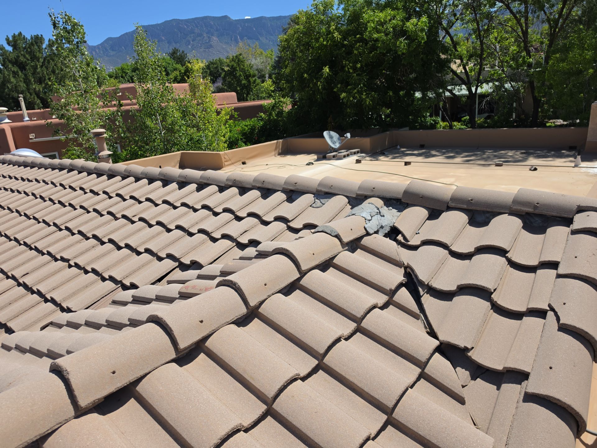 Tile and TPO Roof Maintenance and Gutter Cleaning in Sandia Heights by Doyle Roof Masters Inc