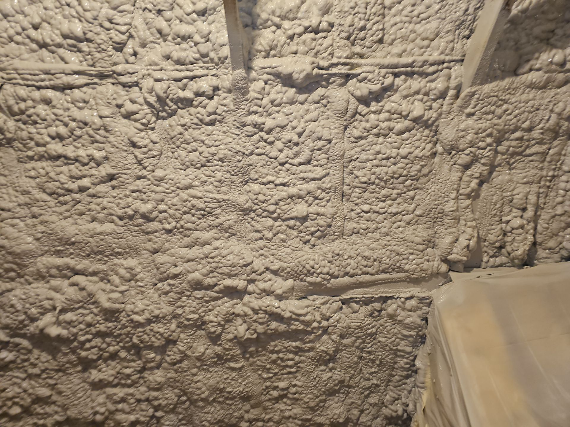 Attic Retrofit using open cell spray foam by NYS Foam & Energy