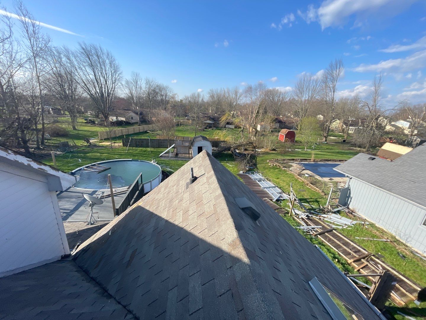 Tornado damage in Whiteland. Roof replacement, James Hardie siding, exterior paint, gutters, windows, doors by 317 Roofing & Restorations