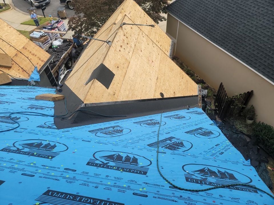 Residential Roofing Installation using Roof Replacement by American Roofing & Construction LLC